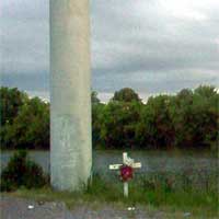 A ghostly face on the colomn on a road marker in New Orleans east, Photo sent to us by Sheile Hebert.