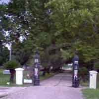 CHALMETTE CEMETERY GATE GHOST PHOTO BY BILL M.