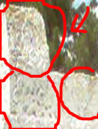 A skull top left, several skulls in various sizes left bottom..... right the facs of two childrens ghosts.