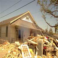 Hurricane Katrina Damage and a ghosts says Lowel Vogler.