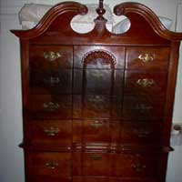 FACE ON THE DRESSER FROM JOEL IN THIS GHOST PHOTO POST HURRICANE KATRINA.