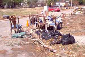 Guardsmen claim to have seen the ghostly images of people sitting in makeshift living rooms such as this on the empty New Orleans streets.  The city still has a hold on many residents - those who survived, and those who did not.
