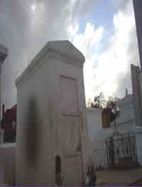 Shadow of Marie Laveaus' ghost on her tomb, photo by Joane Silva.